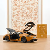 Porsche Cayman GT4 RS w/Weissach Pack 2023 Bahama Yellow 1:18
