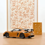 Porsche Cayman GT4 RS w/Weissach Pack 2023 Bahama Yellow 1:18
