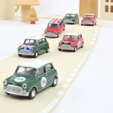 Mini Cooper S 1964 vert amande avec drapeau sur le capot 1/54