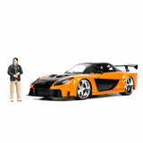  Mazda RX-7 mit Han's Figur Metallic Orange „Fast&Furious“ 1997 1:24