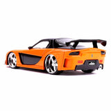  Mazda RX-7 mit Han's Figur Metallic Orange „Fast&Furious“ 1997 1:24